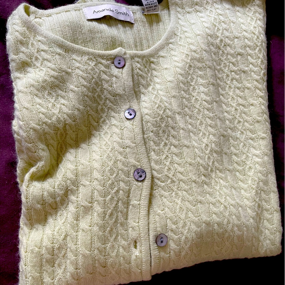 Beautiful cable knit cardigan in celery, color, long sleeves, and button down